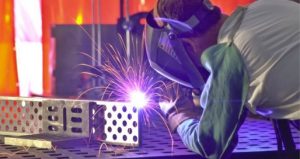 Welding of mechanical part with sparks flying