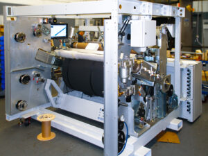 Partially assembled industrial automation machine prototype in PEKO's advanced manufacturing facility, including integrated mechanical, electrical, and controls components.