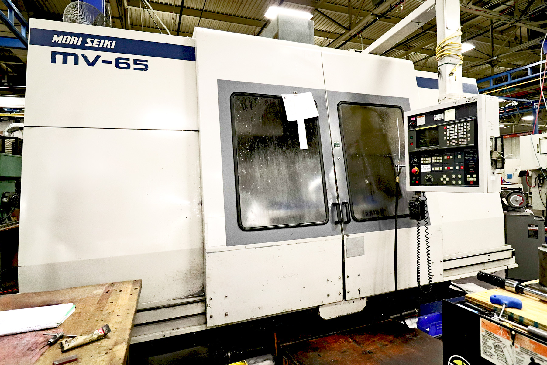 Mori Seiki MV65 CNC Vertical Machining Center inside of PEKO's advanced machining facility