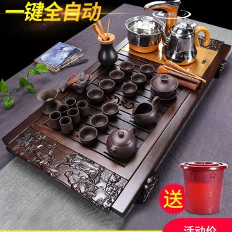The cabinet ebony tea tray domestic tea set automatic purple sand pottery and porcelain of a complete set of kung fu tea sets of real wood the teapot