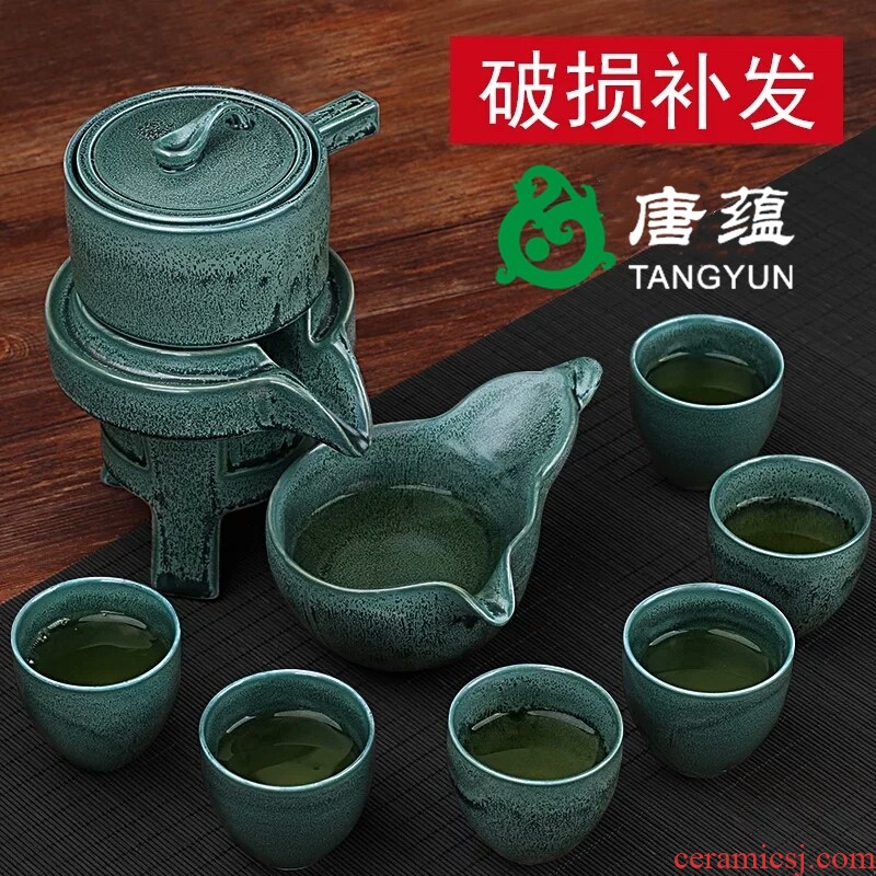 Tang accumulate half automatic kung fu tea set ceramic household lazy creative tea teapot teacup of a complete set of millstones