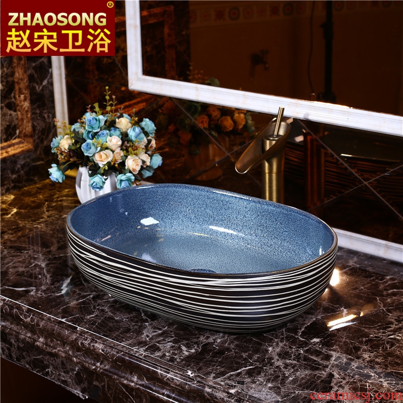 European stage art basin to large-sized ceramic table toilet lavabo oval face basin basin 60 cm