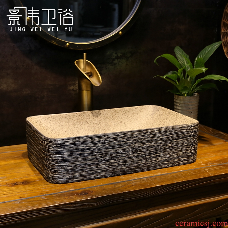 Archaize manual scrub the bathroom on bonsai DE mayor rectangular art basin of black wood grain ceramic wash basin