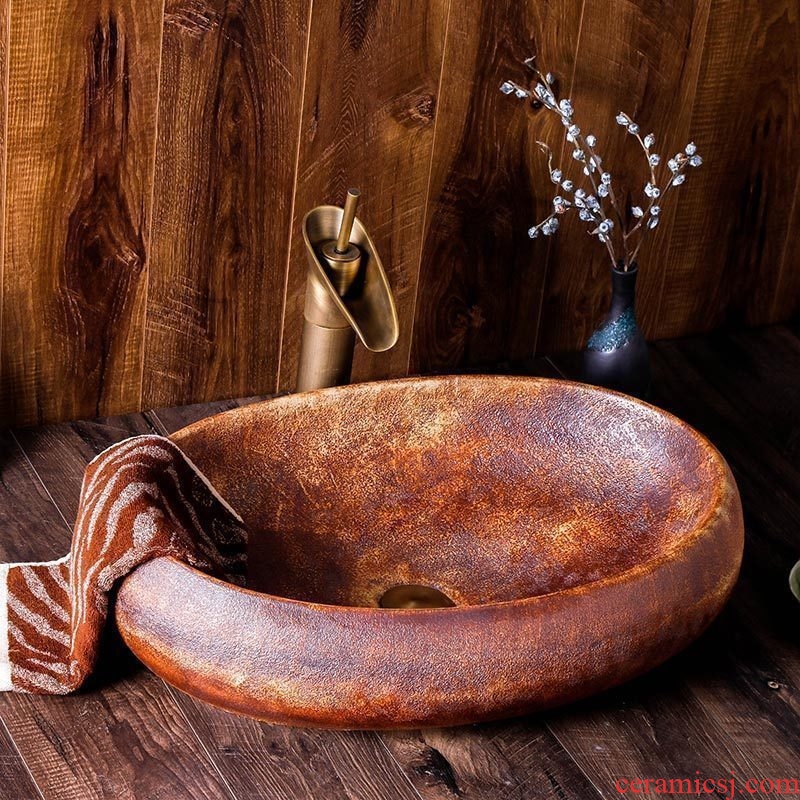 Jingdezhen ceramic sink basin on the oval, the new Chinese style restoring ancient ways character art hotel toilet basin