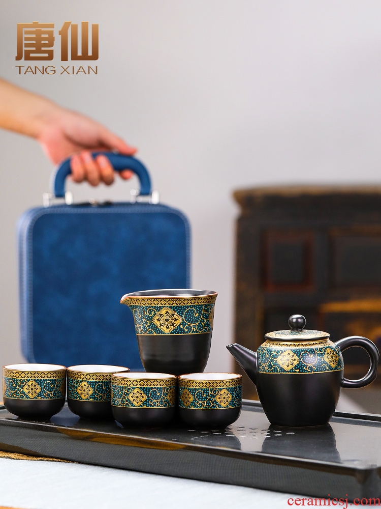 Travel Tang Xian ceramic tea set suit portable tea cup to crack a pot of kung fu tea set four cups of outdoor tourism