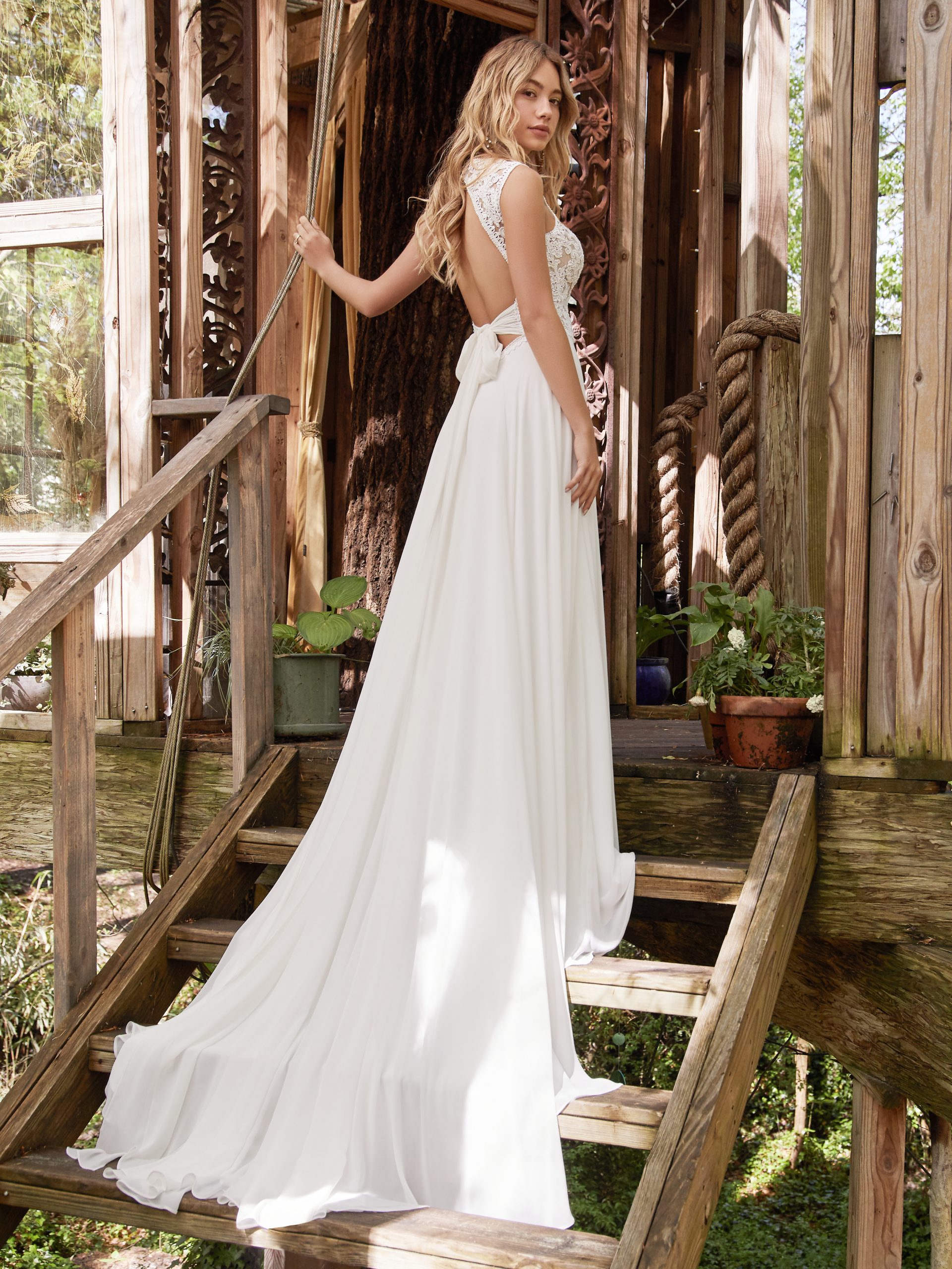 Model Wearing Open Back Wedding Dress Called Gabriella by Rebecca Ingram