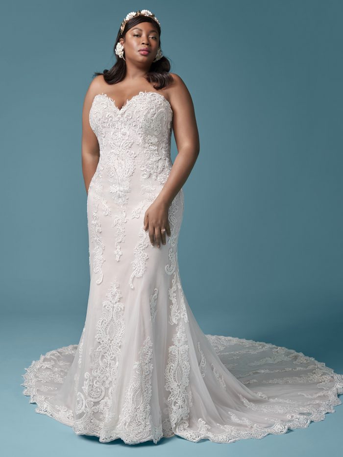 Curvy Model Wearing Strapless Lace Plus Size Fit-and-Flare Wedding Dress Called Clarette Anne by Maggie Sottero