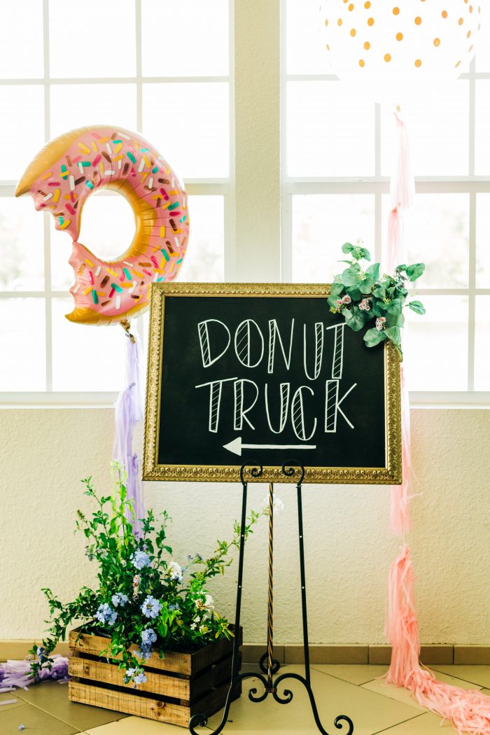 Wedding Details Sign that Says Donut Turck that Way with Donut Balloon