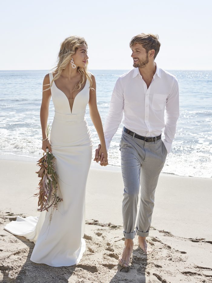Groom with Bride on Beach Wearing Simple Affordable Wedding Dress Called Danica by Rebecca Ingram