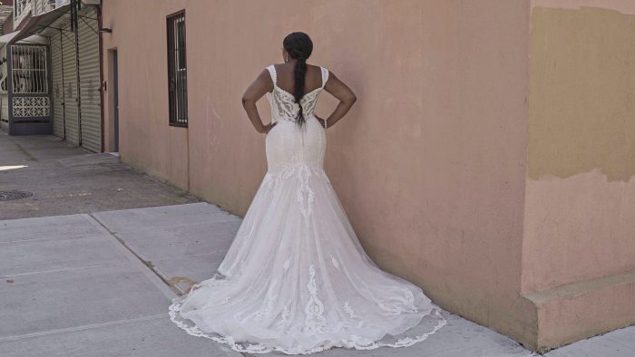 Black Model From Back Wearing Plus Size Mermaid Lace Wedding Gown Called Joss by Sottero and Midgley
