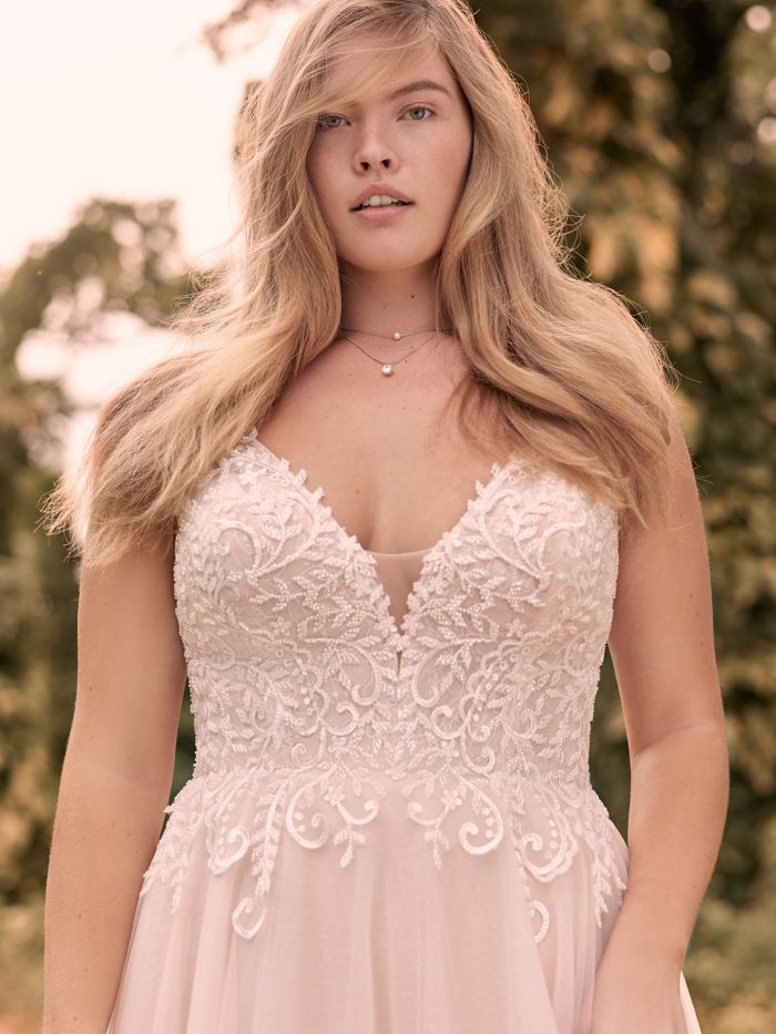 Full Chested Bride Wearing Sweetheart A-line Wedding Dress Called Judy by Rebecca Ingram