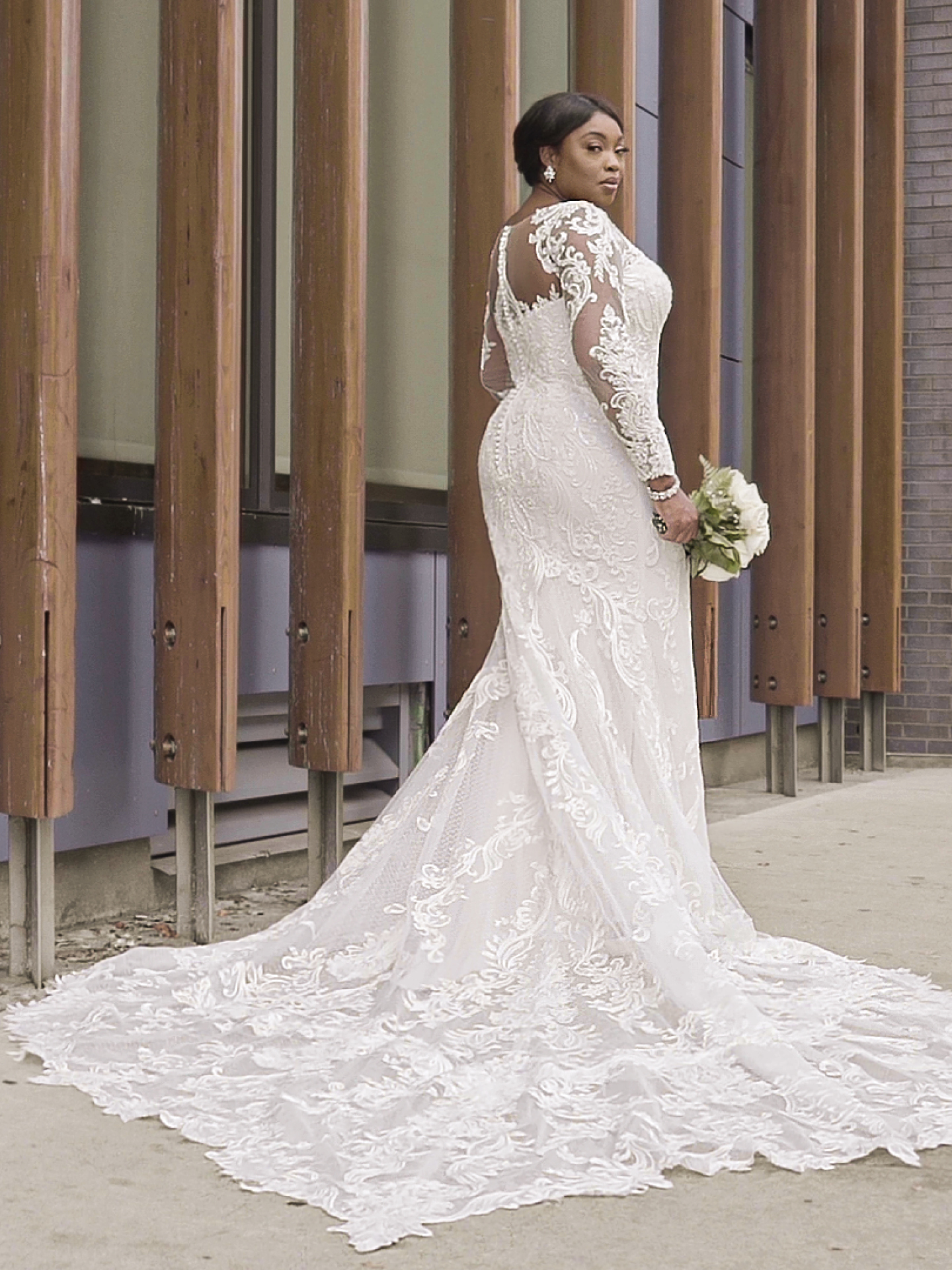 Black Curvy Model Wearing Plus Size Wedding Gown Called Hamilton Lynette by Sottero and Midgley