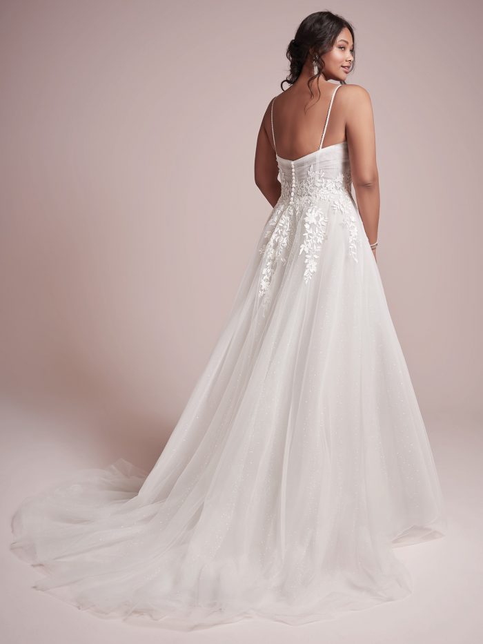 Plus Size Model Wearing Plus Size Princess Wedding Gown Called Mila by Rebecca Ingram