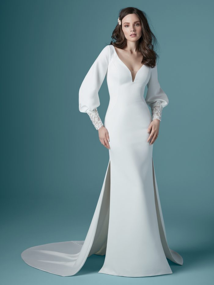 Model Wearing Bishop Sleeve Crepe Wedding Gown Called Aberdeen by Maggie Sottero