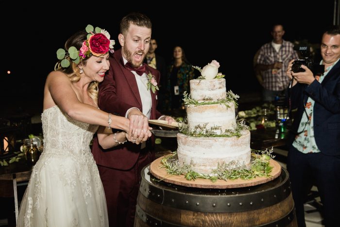 Real Couple Cutting Wedding Cake at Wedding