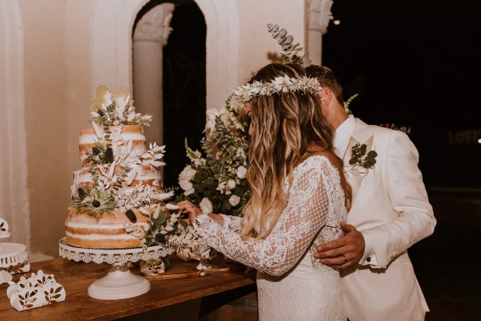 Real Bride and Groom Cutting Wedding Cake to Wedding Playlist