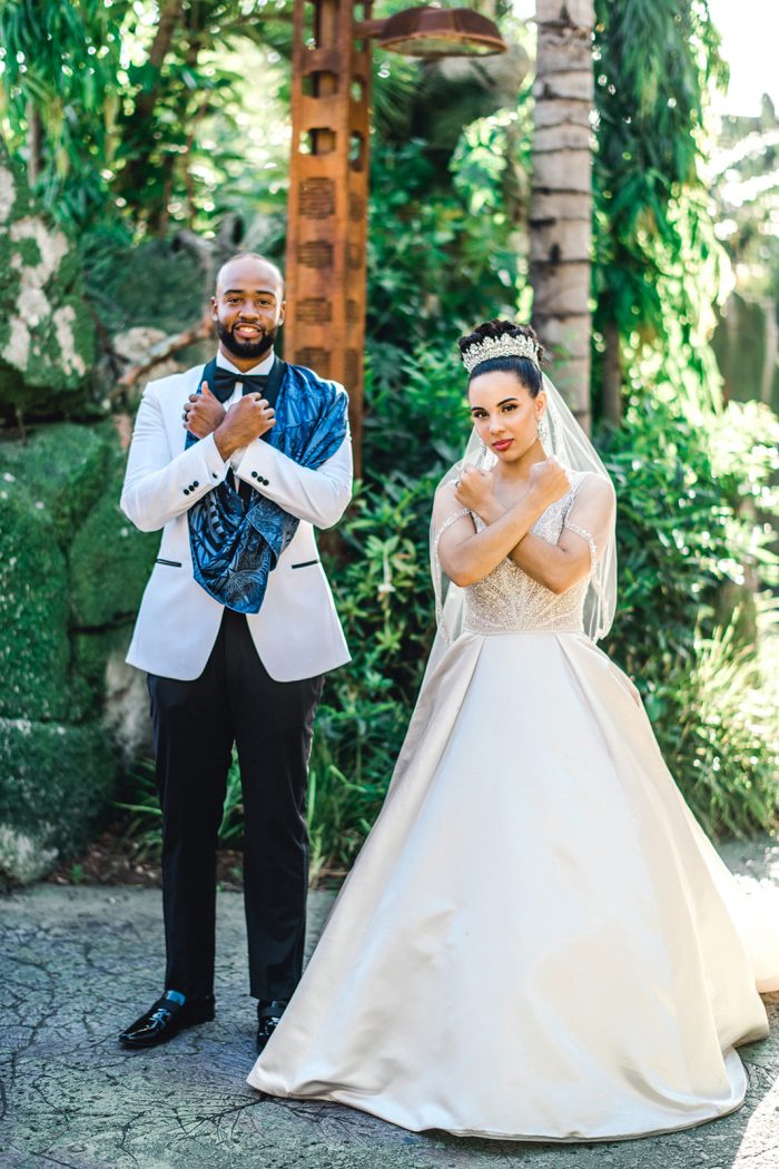 Groom with Real Bride Wearing Princess Ball Gown Wedding Dress by Maggie Sottero in Disney's Animal Kingdom