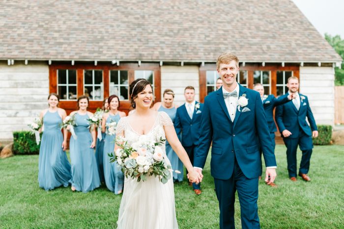 Real Bride and Groom Holding Hands and Walking with Bridesmaids and Groomsmen at Micro Wedding