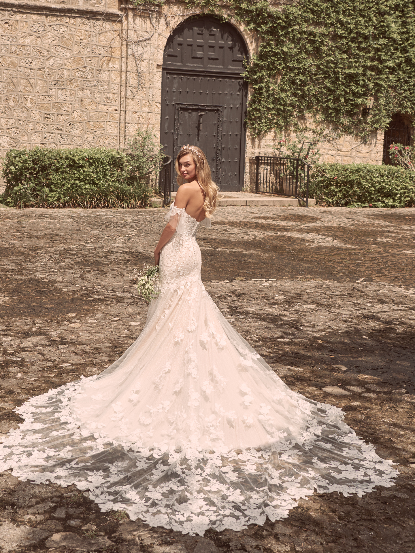 Model Wearing Sparkly Mermaid Bridal Dress with Extended Train Called Joelle by Maggie Sottero