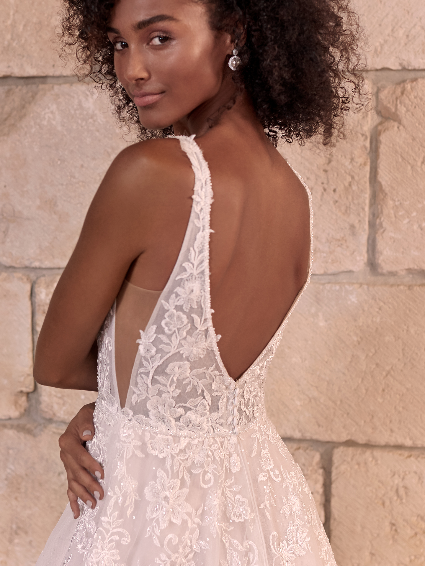 Model Wearing Sheer Bodice A-line Wedding Dress Called Leticia by Maggie Sottero