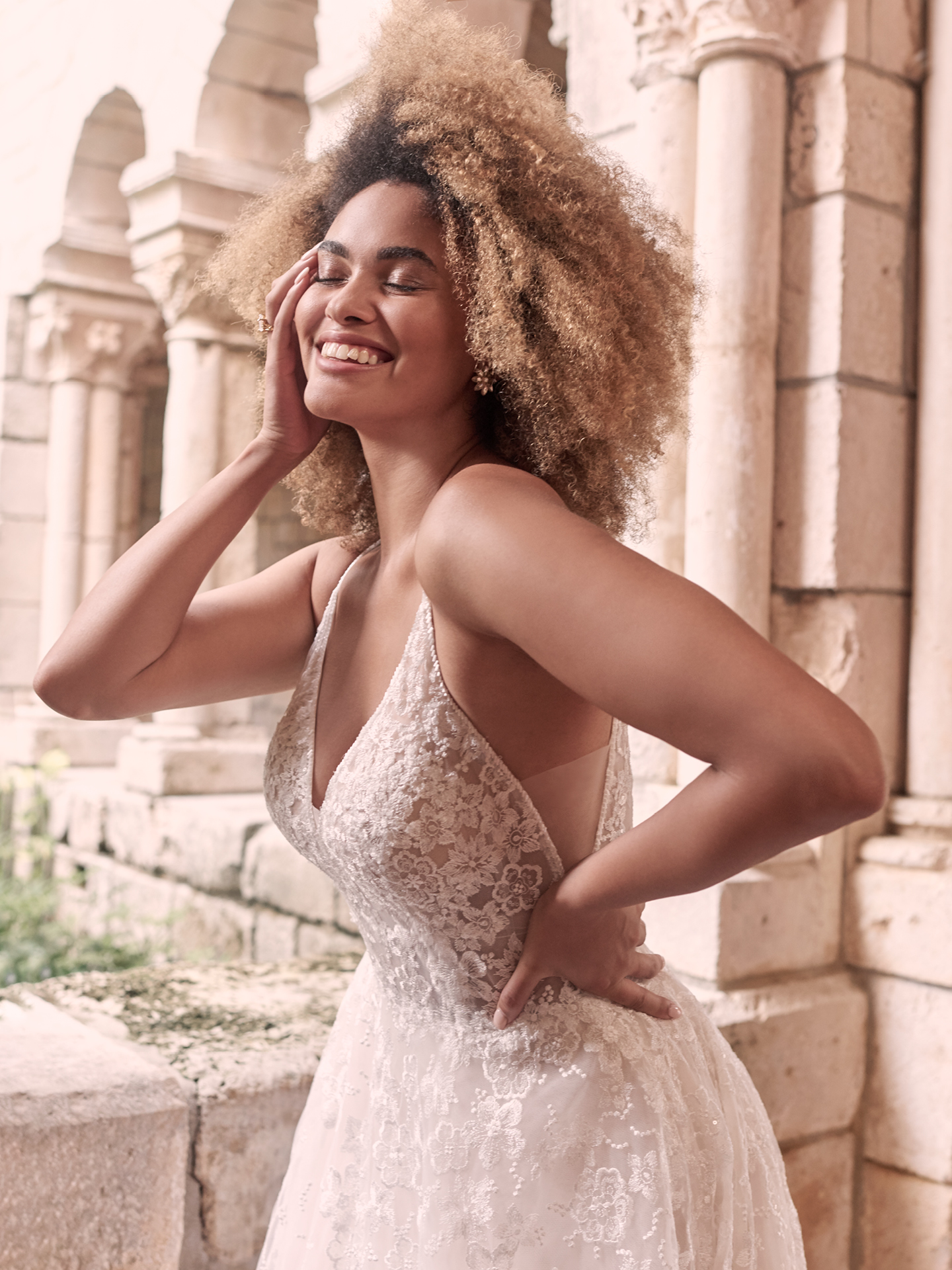 Model Wearing Romantic Floral A-line Wedding Gown Called Lorenza by Maggie Sottero