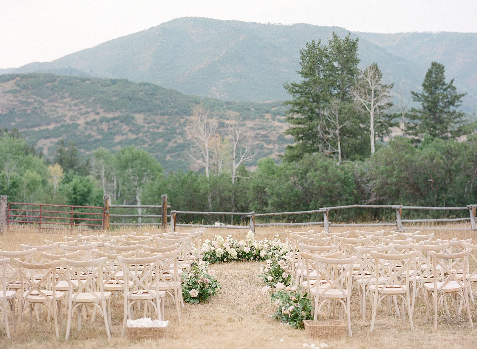 Rustic White and Floral Wedding Ceremony Space for Outdoor Summer Wedding in Utah