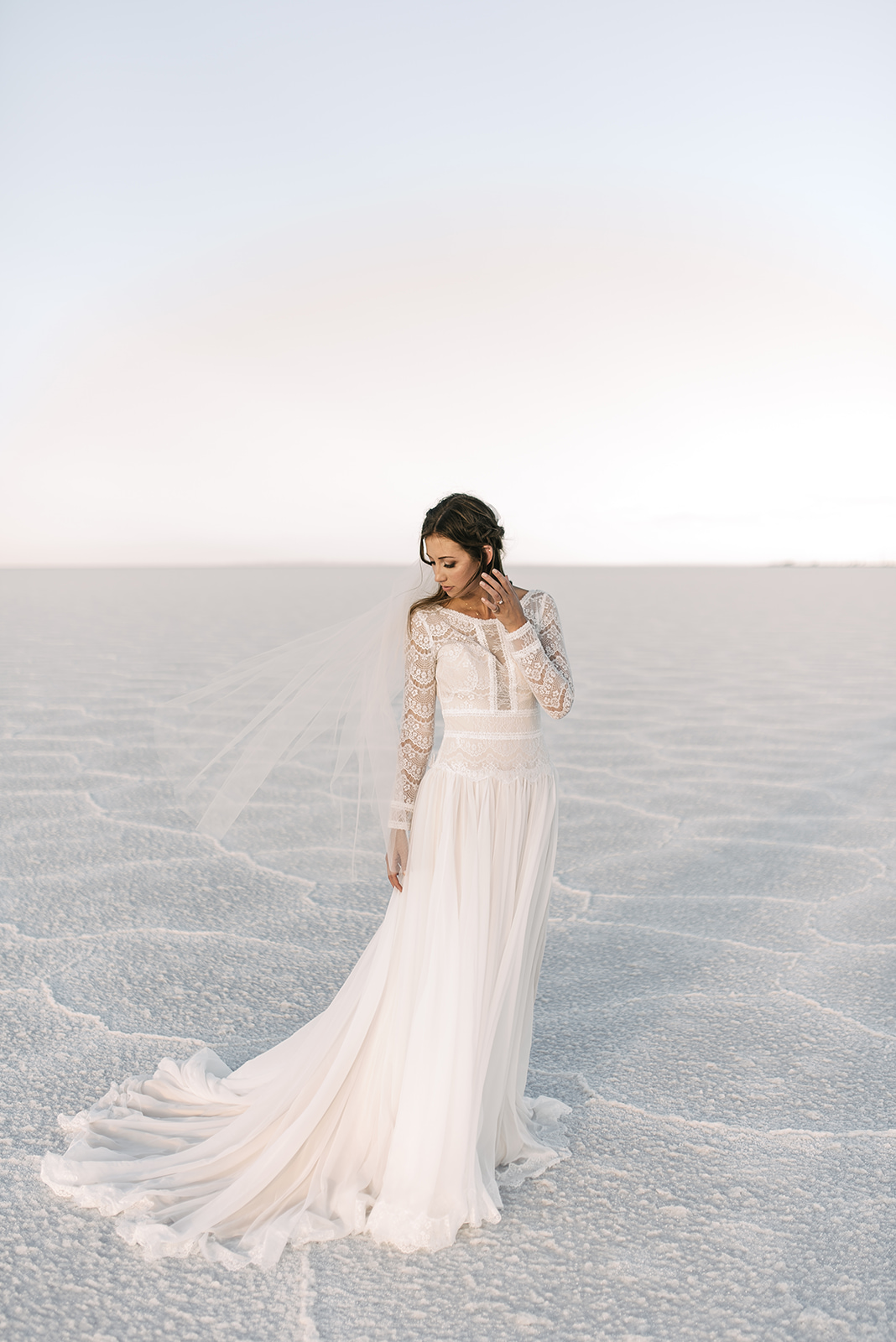 Real Bride at Salt Flats Wearing Lace Long Sleeve Winter Wedding Dress Deirdre by Maggie Sottero