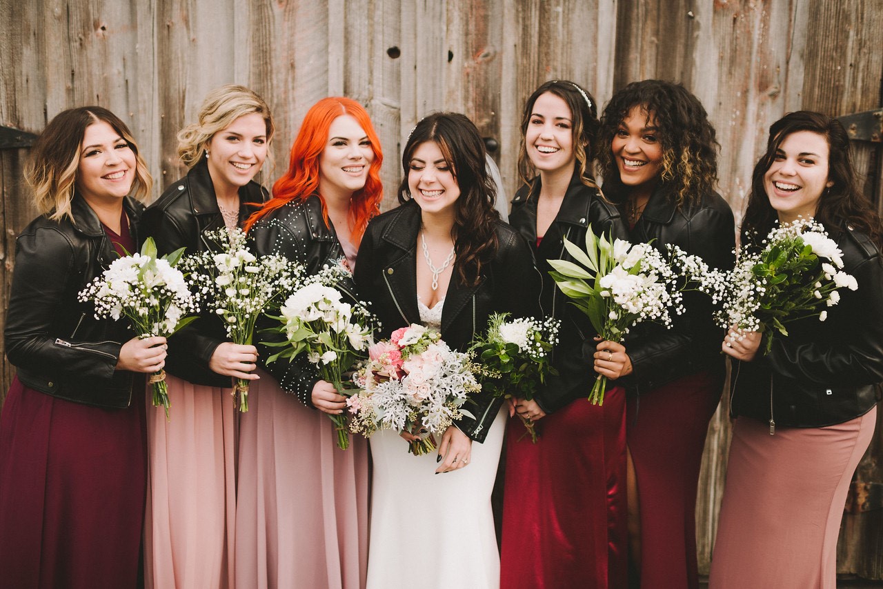 Real Bride with Bridesmaids Wearing Black Leather Jackets at Rocker Wedding