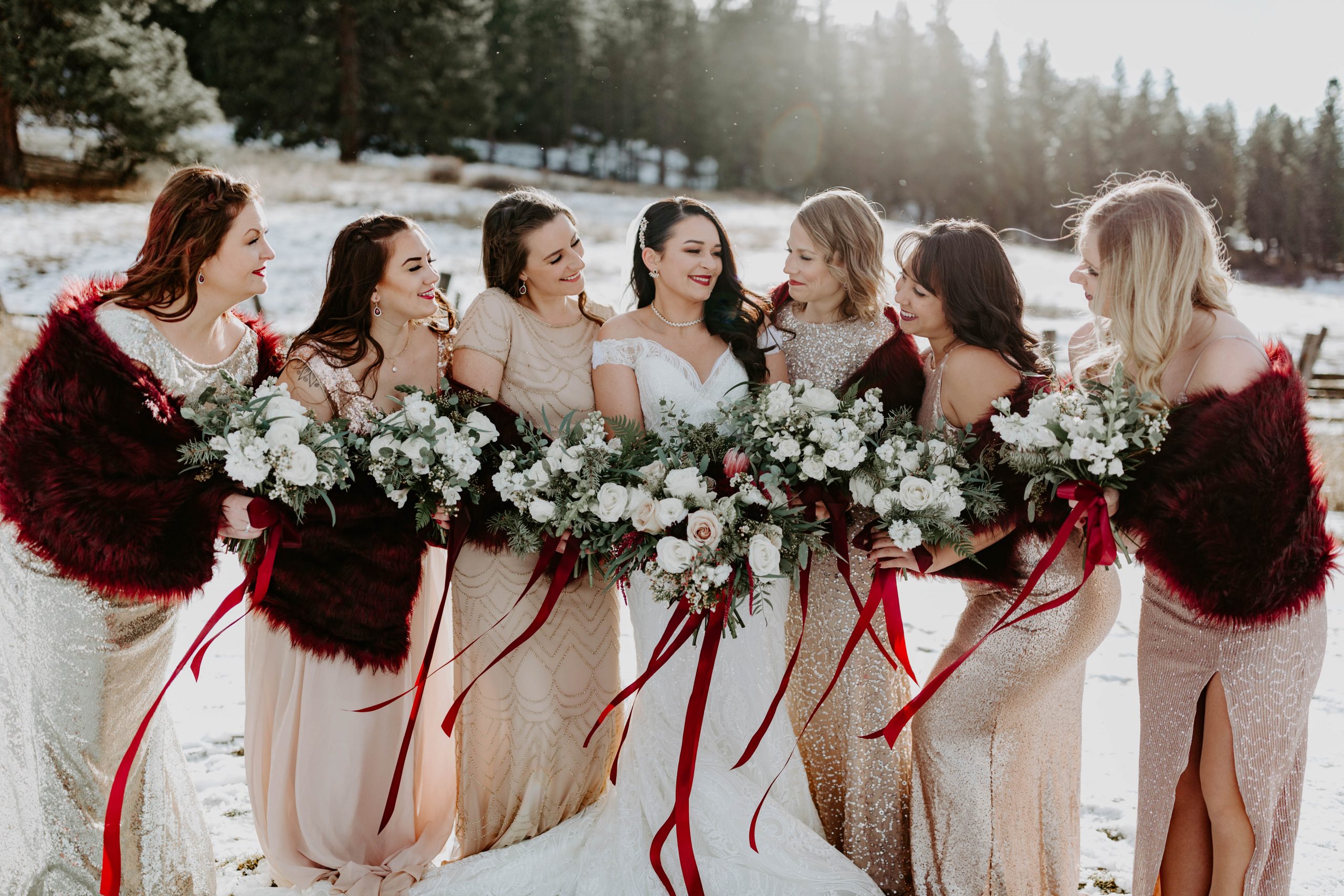 Real Bride Wearing Maggie Sottero Wedding Dress at Winter Wedding with Bridesmaids