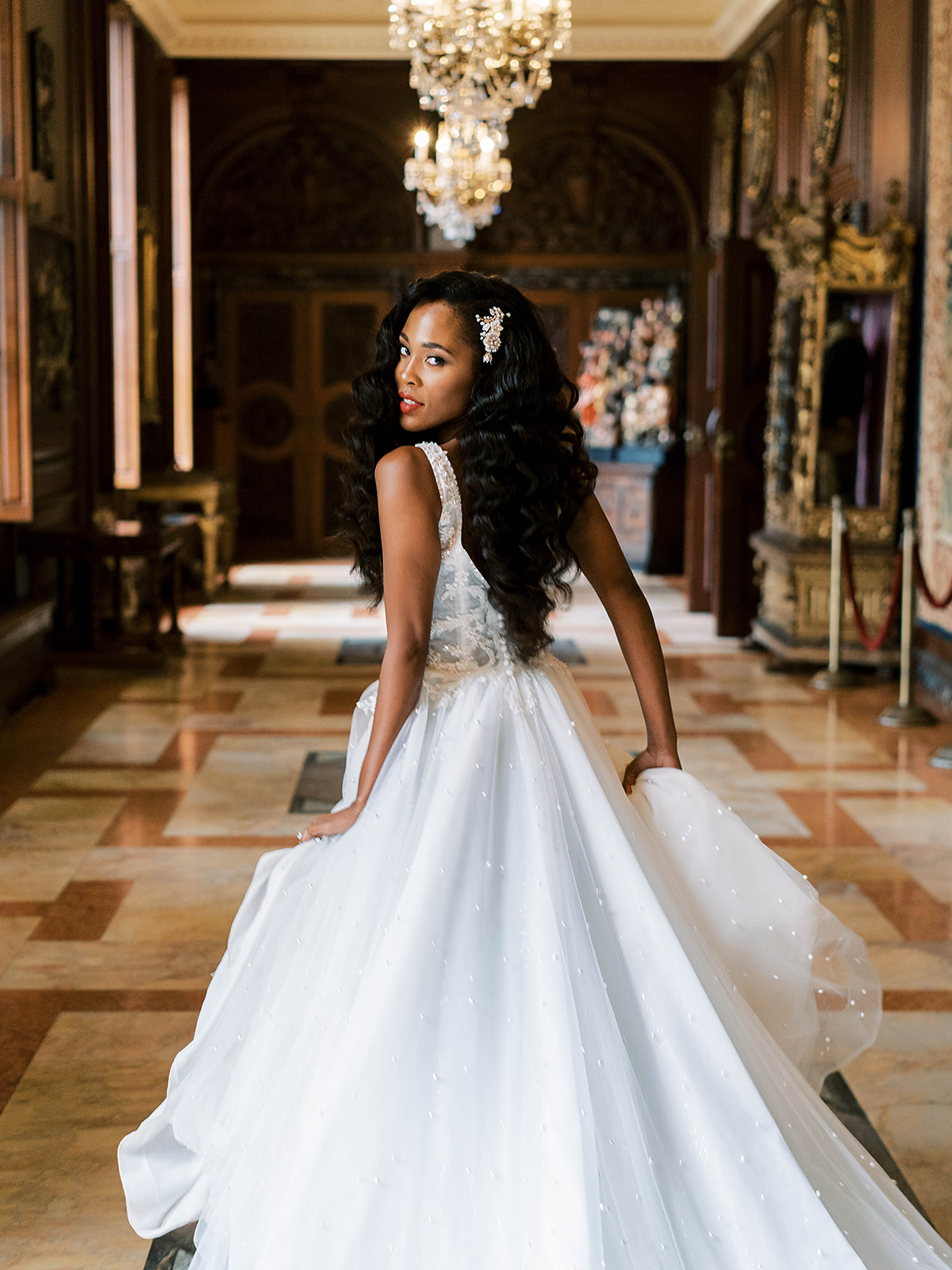 Model wearing Elevated Gown with Precious Pearl Details: Pierce by Sottero and Midgley in a royal inspired shoot