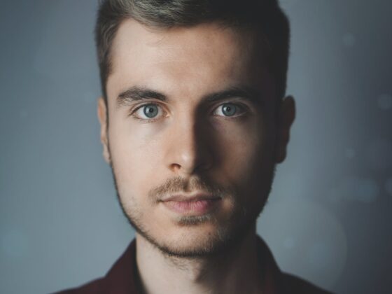 man in brown polo shirt