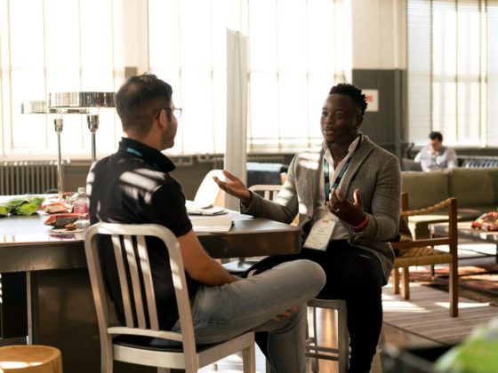 photo of men having conversation