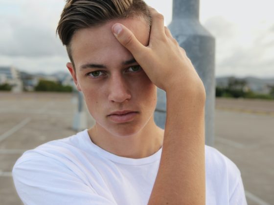 men's white crew-neck top close-up photography