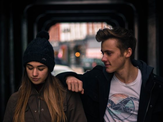 young couple in city at night
