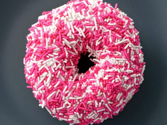 doughnut with white and pink sprinkles