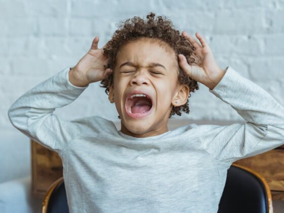 desperate screaming young boy