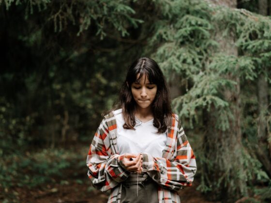 teen in a plaid jacket